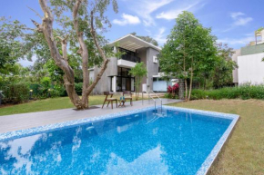 Villa Foresta by StayVista with Modern decor, Swimming pool & Expansive lawn for a perfect escape